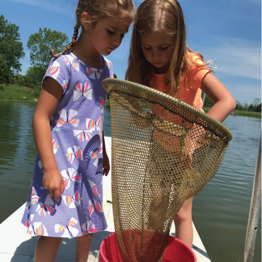 Photo of kids with a water net